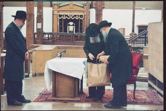 Letters gathered in a bag beside the Rebbe's lectern